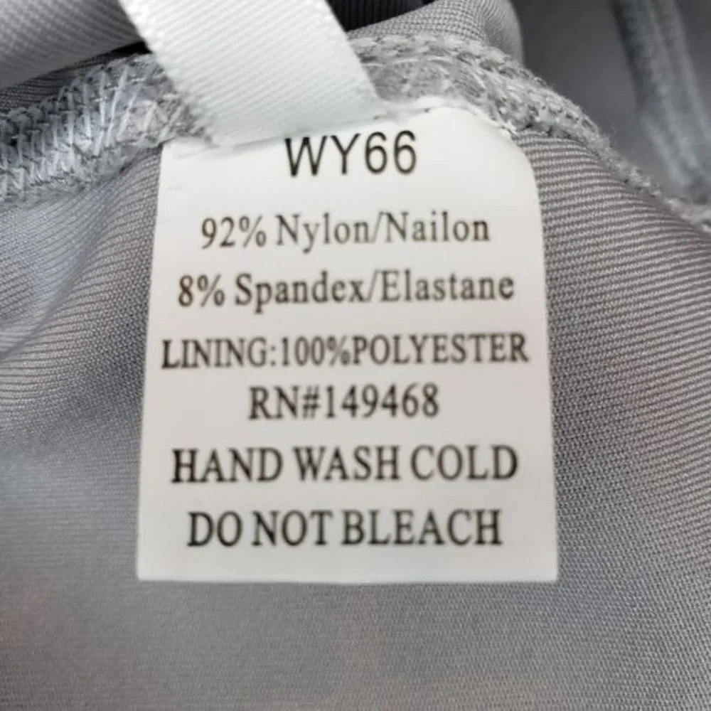 NWT JVINI gray leggings with sheer‎ side pa…